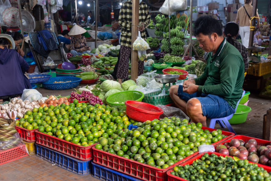 Vendeurs de citrons au marché de Tan Chau, Mékong